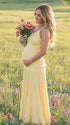 yellow maternity gown backless flowy tiered skirt summer photoshoot pregnancy dress