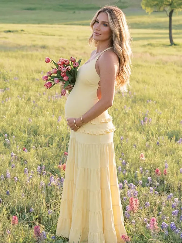 yellow maternity gown backless flowy tiered skirt summer photoshoot pregnancy dress