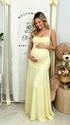 Butter Yellow ruched corset maternity maxi dress with adjustable straps, made from high-stretch milk silk fabric, elegant backless baby shower gown for maternity photoshoot and special occasions.