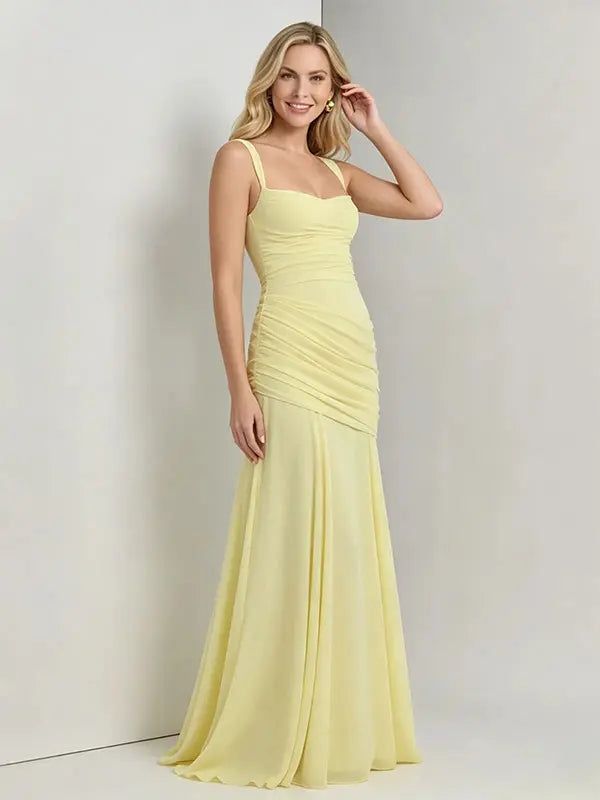 Butter Yellow ruched corset maternity maxi dress with adjustable straps, made from high-stretch milk silk fabric, elegant backless baby shower gown for maternity photoshoot and special occasions.