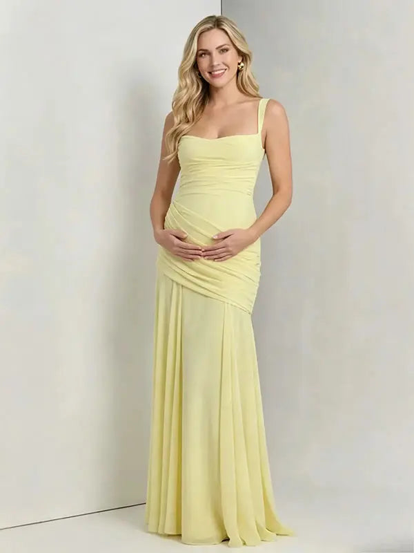 Butter Yellow ruched corset maternity maxi dress with adjustable straps, made from high-stretch milk silk fabric, elegant backless baby shower gown for maternity photoshoot and special occasions.