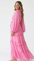 hot pink lace trim maternity maxi dress with long sleeves and flowing tiered skirt