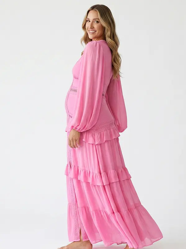 hot pink lace trim maternity maxi dress with long sleeves and flowing tiered skirt