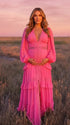 hot pink lace trim maternity maxi dress with long sleeves and flowing tiered skirt
