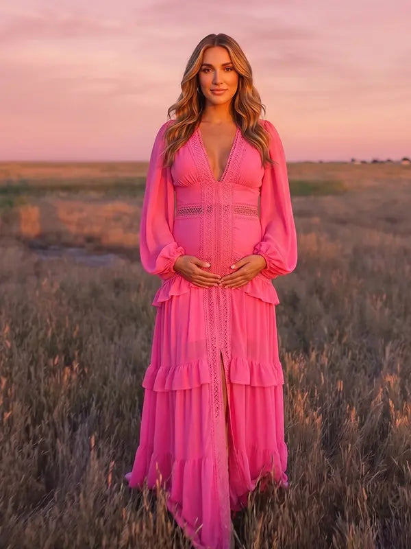 hot pink lace trim maternity maxi dress with long sleeves and flowing tiered skirt