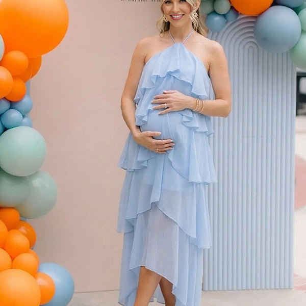 Lighy blue maternity dress with halter neck and ruffle layer for baby shower, maternity photoshoot and gender reveal party.