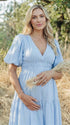 Blue v neck maternity maxi dress for baby shower, gender reveal and maternity photoshoot.