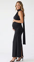 black halter maternity maxi dress with ruched bodycon silhouette and cross neck detail