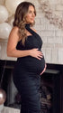 black halter maternity maxi dress with ruched bodycon silhouette and cross neck detail