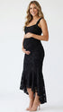 black jacquard maternity midi dress with corset bodice and high low hem