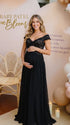 A black lace off shoulder maternity maxi dress with a flowing chiffon skirt for baby shower, maternity photoshoot, gender reveal and formal pregnancy occasions.