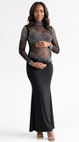 Pregnant woman wearing a black long sleeve rhinestone illusion mesh maternity mermaid maxi dress for luxury maternity photoshoots, baby showers, pregnancy announcements, editorial portraits, and formal events.