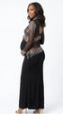 Pregnant woman wearing a black long sleeve rhinestone illusion mesh maternity mermaid maxi dress for luxury maternity photoshoots, baby showers, pregnancy announcements, editorial portraits, and formal events.
