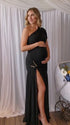 Black one shoulder maternity gown with ruched silhouette and high slit for elegant pregnancy photoshoots