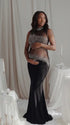 A black rhinestone illusion mesh maternity mermaid maxi dress for luxury maternity photoshoots, baby showers, editorial portraits, and formal pregnancy events.
