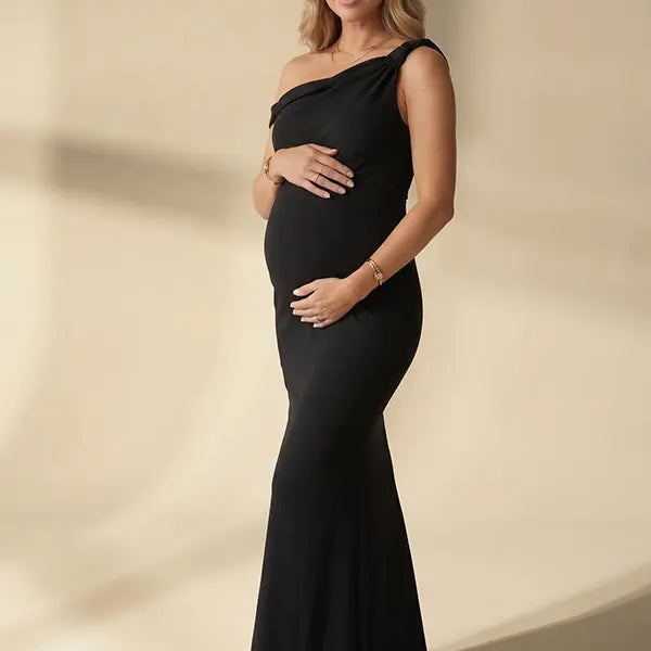 black solid off shoulder maternity maxi dress with bodycon silhouette
