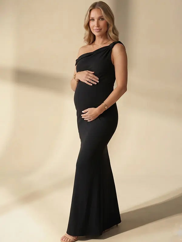 black solid off shoulder maternity maxi dress with bodycon silhouette