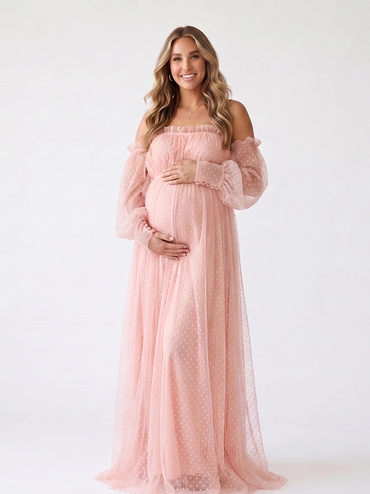 Blush Pink Off Shoulder Maternity Photoshoot Dress with Sheer Long Sleeves and Flowing Floor Length Skirt | Bumplook