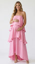 blush pink tiered ruffle maternity maxi dress with flowy layers and spaghetti straps