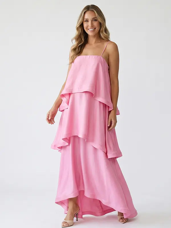 blush pink tiered ruffle maternity maxi dress with flowy layers and spaghetti straps