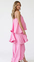 blush pink tiered ruffle maternity maxi dress with flowy layers and spaghetti straps
