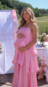 blush pink tiered ruffle maternity maxi dress with flowy layers and spaghetti straps