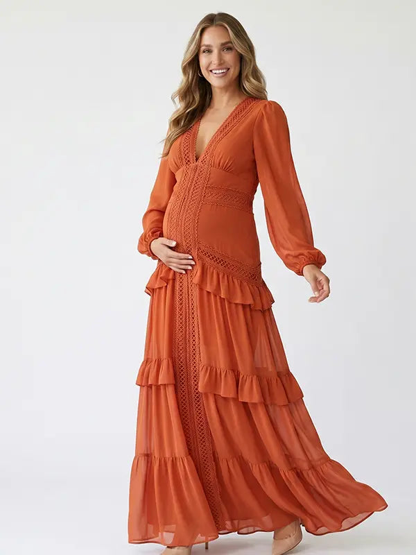 burnt orange lace trim maternity maxi dress with long sleeves and flowing tiered skirt