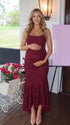 burgundy jacquard maternity midi dress with corset bodice and high low hem