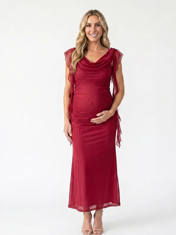 burgundy mesh maternity gown with draped neckline and cascading ruffle details