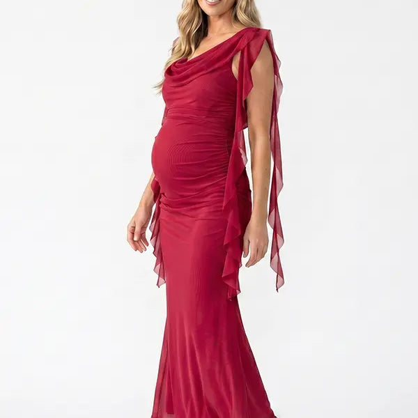 burgundy mesh maternity gown with draped neckline and cascading ruffle details
