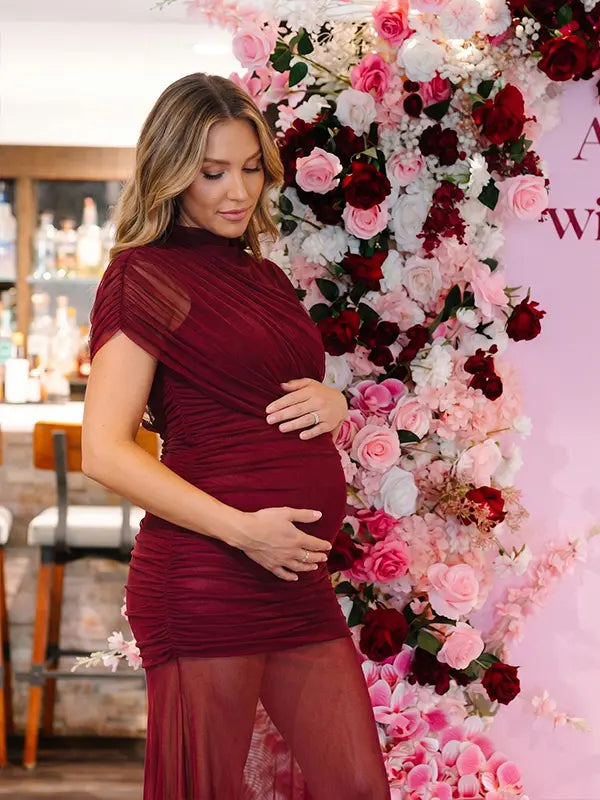 burgundy mesh maternity photoshoot dress with ruched bodycon silhouette and sheer train