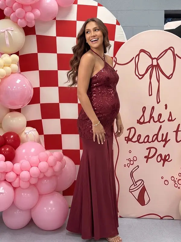 Burgundy Sequin Halter Mermaid Maternity Maxi Dress with Floral Embroidery and Open Back for Baby Shower, Maternity Photoshoot, Pregnancy Announcement, Gender Reveal, Wedding Guest, Christmas Photos and Formal Events | Bumplook