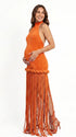 Burnt orange fringe halter maternity maxi dress with tassel hem, bodycon pregnancy gown for fall baby showers, pumpkin patch maternity photoshoots, harvest celebrations, and autumn pregnancy portraits.