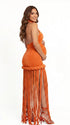 Burnt orange fringe halter maternity maxi dress with tassel hem, bodycon pregnancy gown for fall baby showers, pumpkin patch maternity photoshoots, harvest celebrations, and autumn pregnancy portraits.