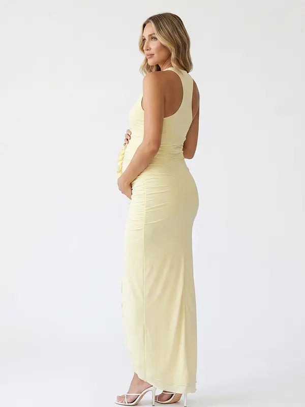butter yellow floral halter maternity dress with ruched silhouette and front slit for baby shower
