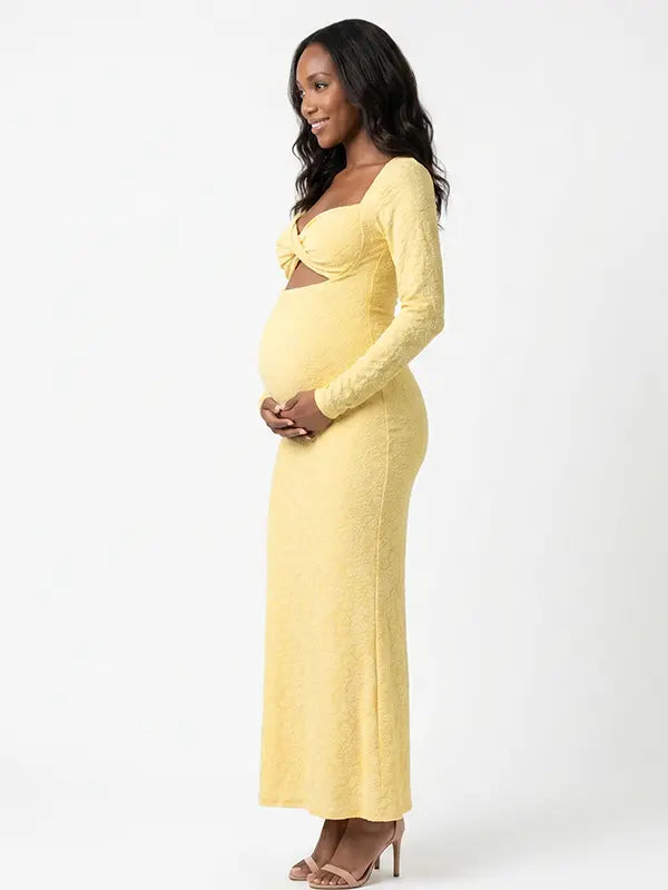 butter yellow lace maternity gown with long sleeves twist front neckline and mermaid silhouette