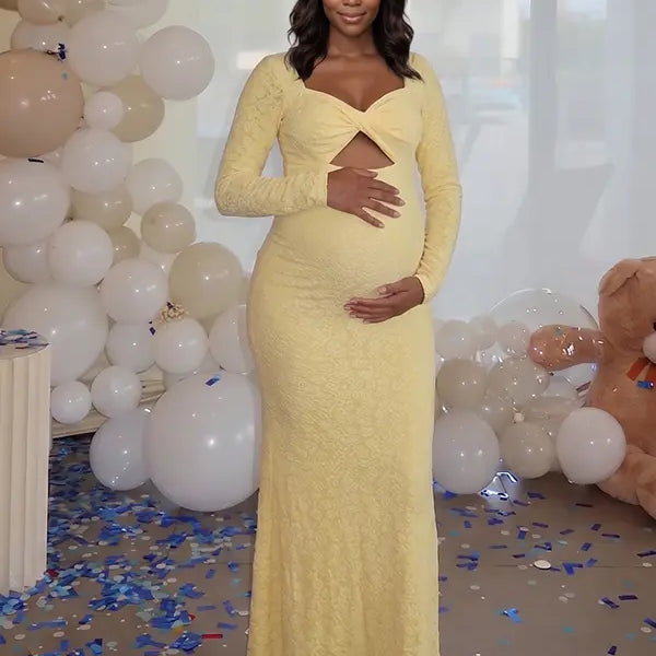 butter yellow lace maternity gown with long sleeves twist front neckline and mermaid silhouette