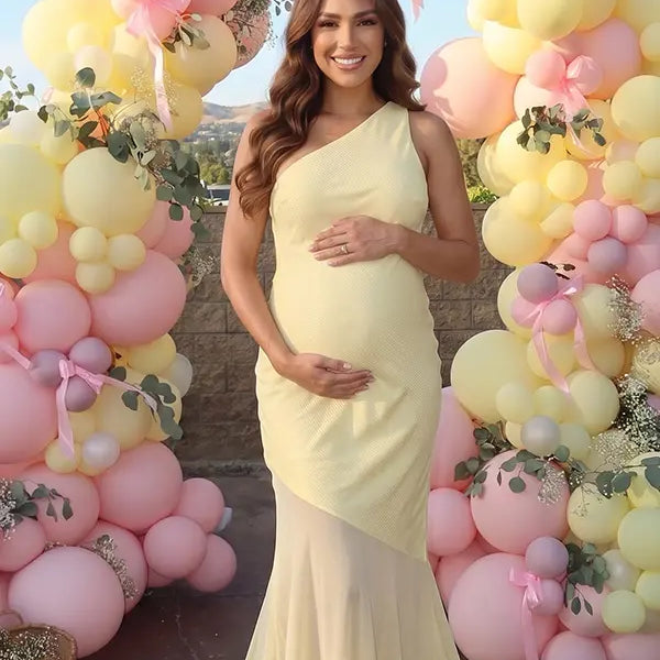 butter yellow one shoulder maternity maxi dress with open back and mesh hem