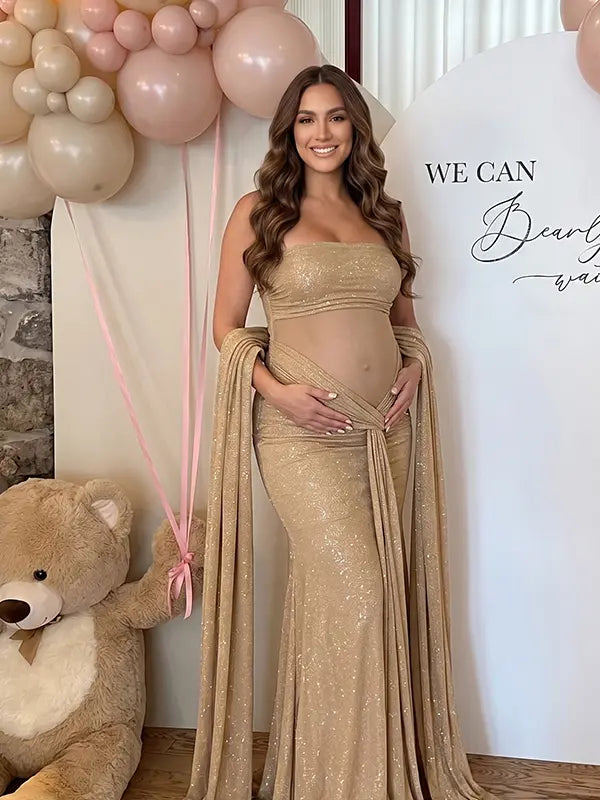 luxury champagne maternity dress with glitter mesh fabric and draped sleeves for maternity photoshoot