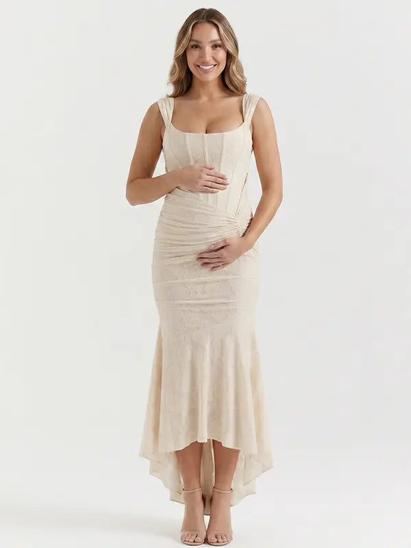 champagne jacquard maternity midi dress with corset bodice and high low hem