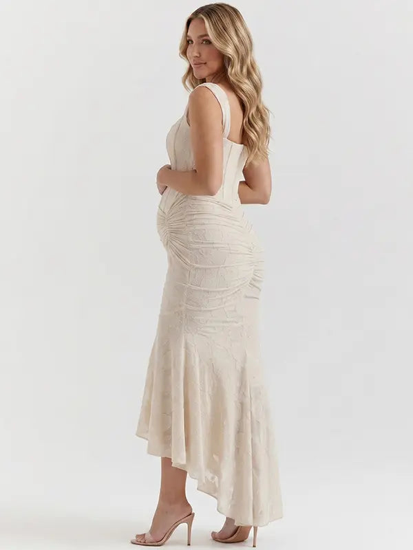 champagne jacquard maternity midi dress with corset bodice and high low hem