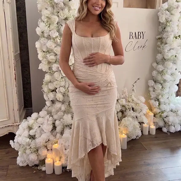 champagne jacquard maternity midi dress with corset bodice and high low hem