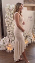 champagne jacquard maternity midi dress with corset bodice and high low hem