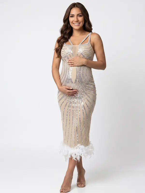 A champagne sequin feather trim maternity midi dress with illusion mesh, perfect for luxury maternity photoshoots, Gatsby baby showers, pregnancy announcements, and elegant formal celebrations.