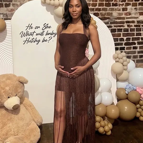 Chocolate brown glitter fringe halter maternity maxi dress with long tassel fringe, bodycon pregnancy gown for luxury maternity photoshoots, baby showers, birthdays, western-inspired sessions, and glamorous pregnancy portraits.