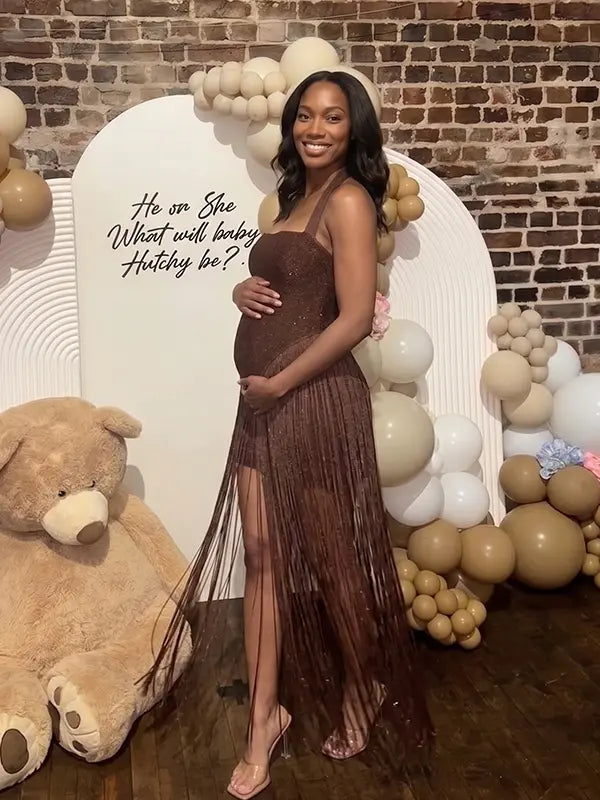 Chocolate brown glitter fringe halter maternity maxi dress with long tassel fringe, bodycon pregnancy gown for luxury maternity photoshoots, baby showers, birthdays, western-inspired sessions, and glamorous pregnancy portraits.