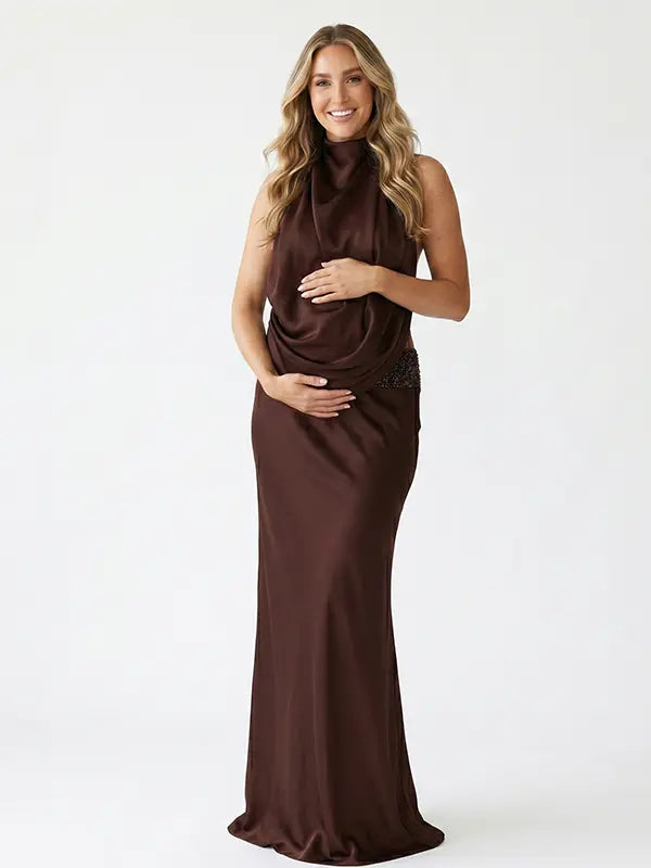 chocolate brown halter maternity gown with open back design and beaded waist detail