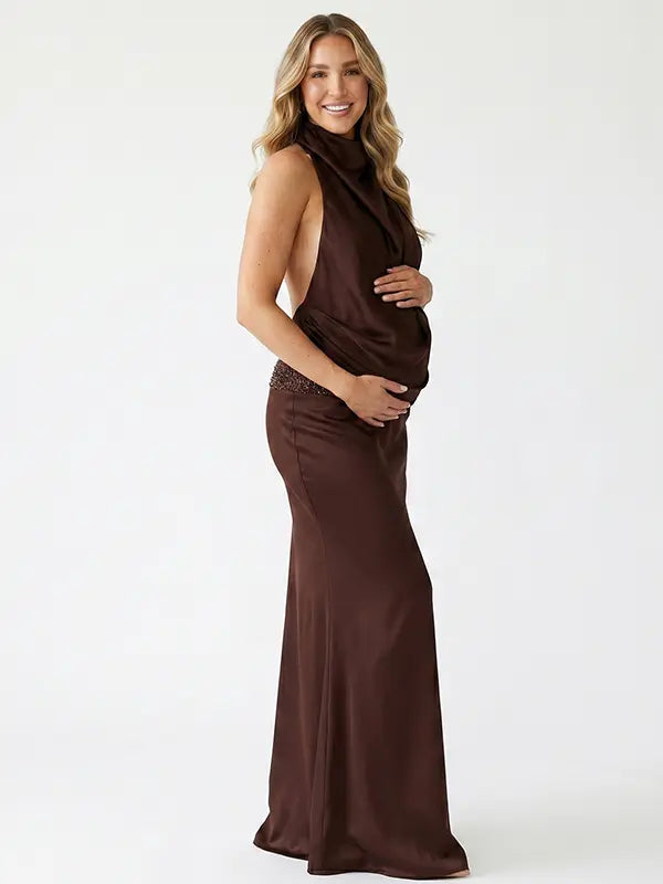 chocolate brown halter maternity gown with open back design and beaded waist detail