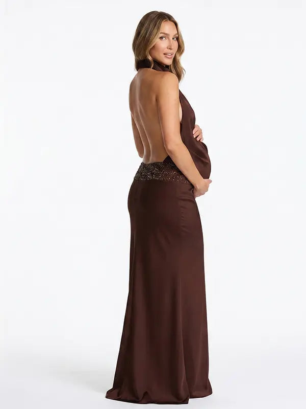 chocolate brown halter maternity gown with open back design and beaded waist detail
