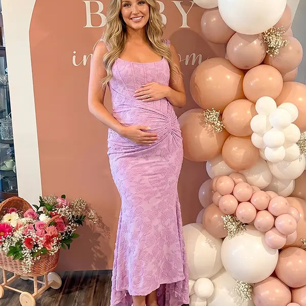 dusty lilac jacquard maternity midi dress with corset bodice and high low hem